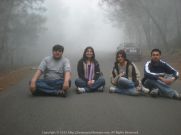 Sitting on the misty roadways @ Kodaikanal with Aditya, Pallavi and Poulomi